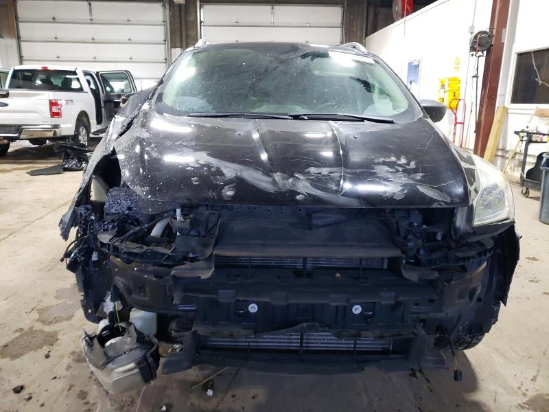 Foto 5 de la subasta – 2016 FORD ESCAPE TIT con VIN 1FMCU9J91GUB92238