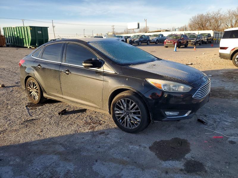 Photo 4 from auction – 2016 FORD FOCUS with VIN 1FADP3J29GL281793