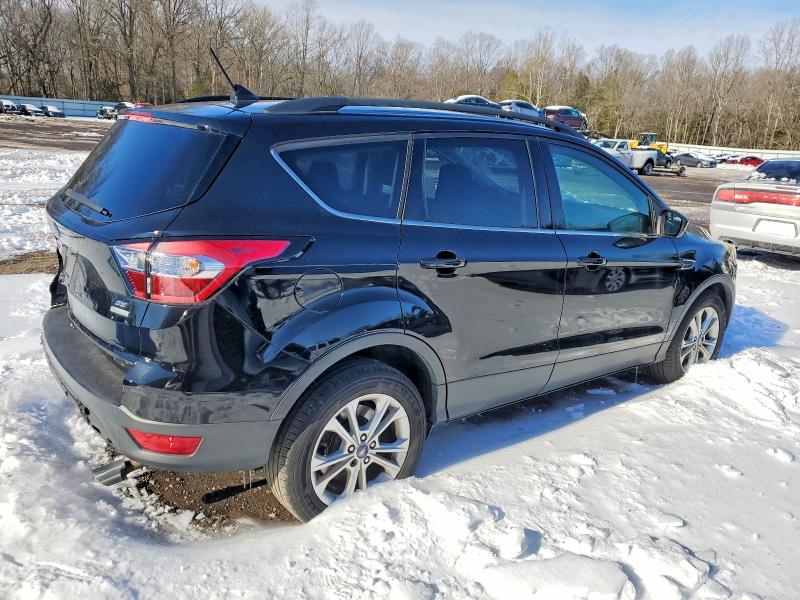 Photo 3 from auction – 2018 FORD ESCAPE SE with VIN 1FMCU0GD3JUA40962