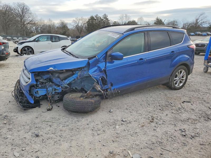 FORD ESCAPE SE 2018 with VIN 1FMCU9GD0JUA60459 - Photo from auction