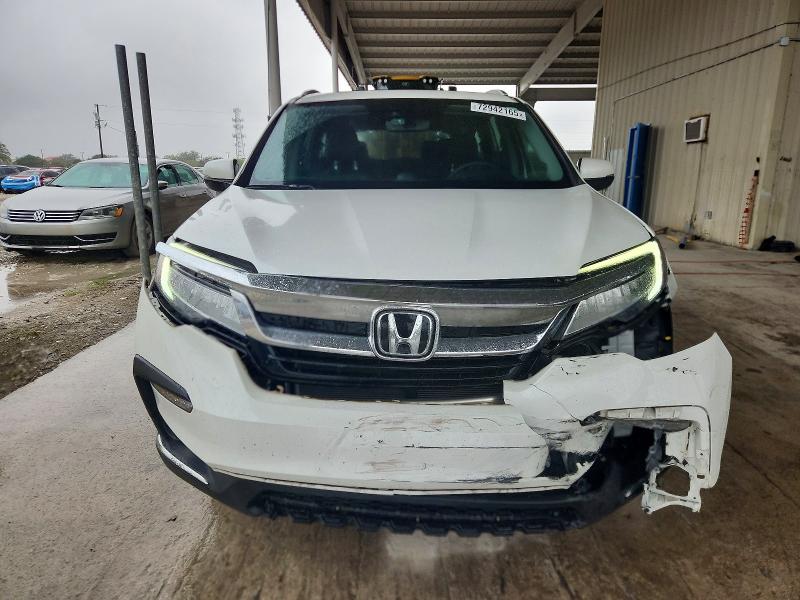 Photo 5 from auction – 2022 HONDA PILOT TOUR with VIN 5FNYF5H69NB025317