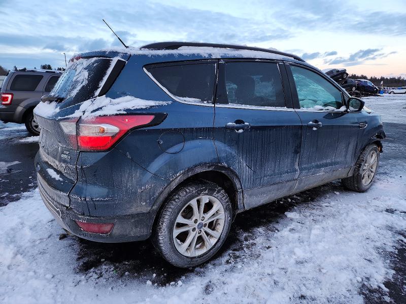 Photo 3 from auction – 2018 FORD ESCAPE SE with VIN 1FMCU9GD5JUA32365