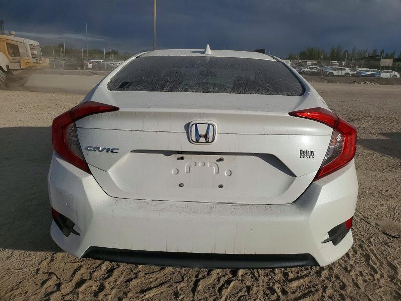 Photo 6 from auction – 2018 HONDA CIVIC EX with VIN 19XFC2F74JE036011