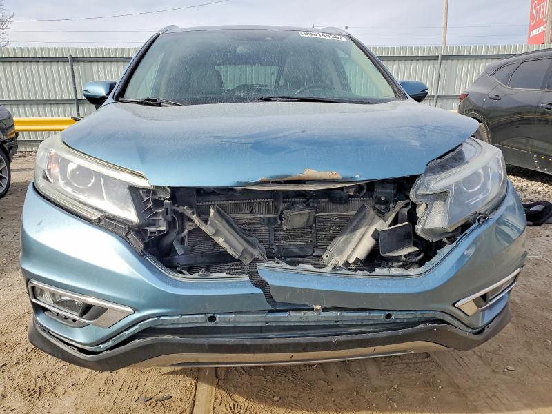 Photo 5 from auction – 2015 HONDA CR-V with VIN 5J6RM3H98FL007554