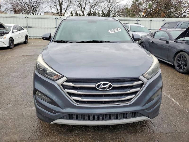 Photo 5 from auction – 2017 HYUNDAI TUCSON with VIN KM8J33A22HU371948