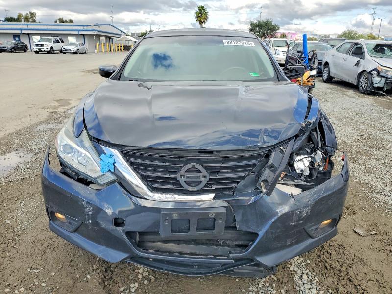Photo 5 from auction – 2018 NISSAN ALTIMA 2.5 with VIN 1N4AL3AP3JC123385