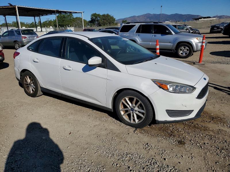 Photo 4 from auction – 2018 FORD FOCUS SE with VIN 1FADP3FE2JL322582