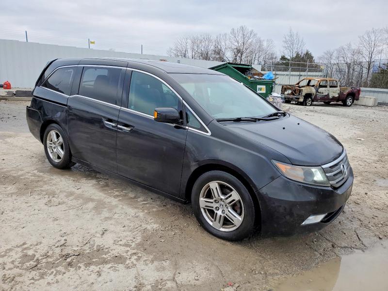 Photo 4 from auction – 2011 HONDA ODYSSEY TO with VIN 5FNRL5H96BB028923