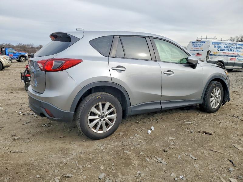 Photo 3 from auction – 2014 MAZDA CX-5 with VIN JM3KE2BE0E0398436