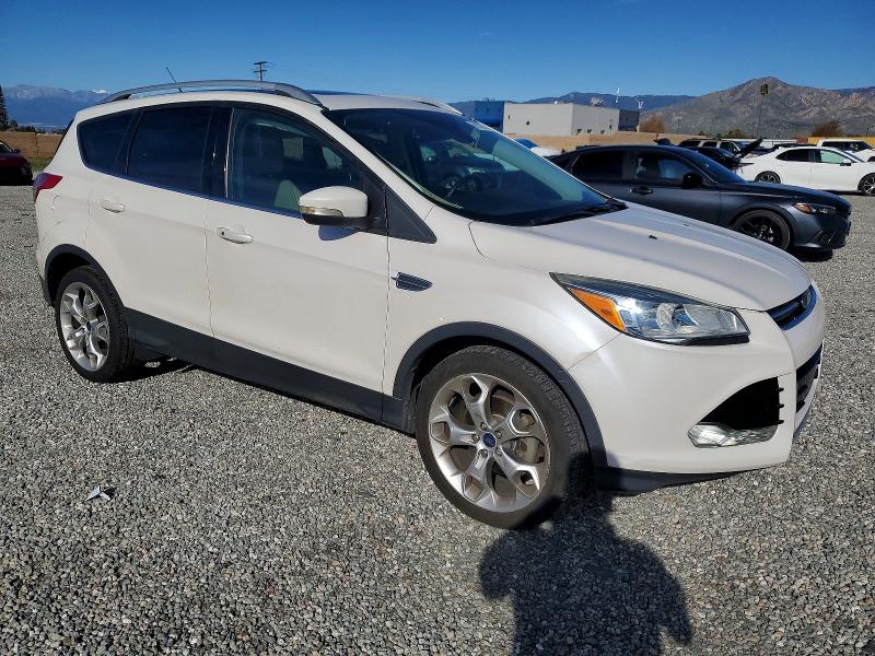 Photo 4 from auction – 2014 FORD ESCAPE TIT with VIN 1FMCU0JXXEUD48767