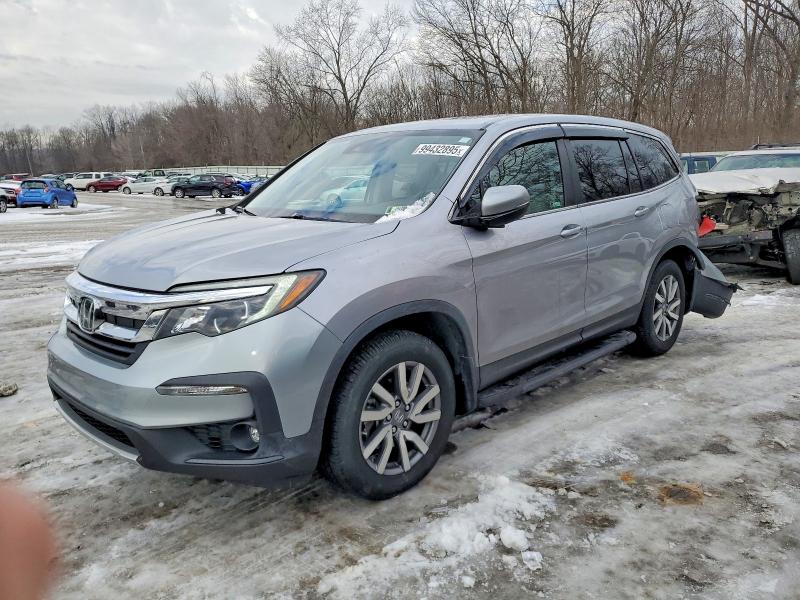 HONDA PILOT EXL 2021 with VIN 5FNYF6H50MB010281 - Photo from auction