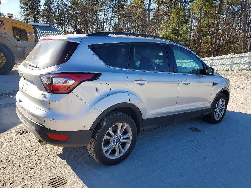 Photo 3 from auction – 2018 FORD ESCAPE with VIN 1FMCU9GD8JUB29351