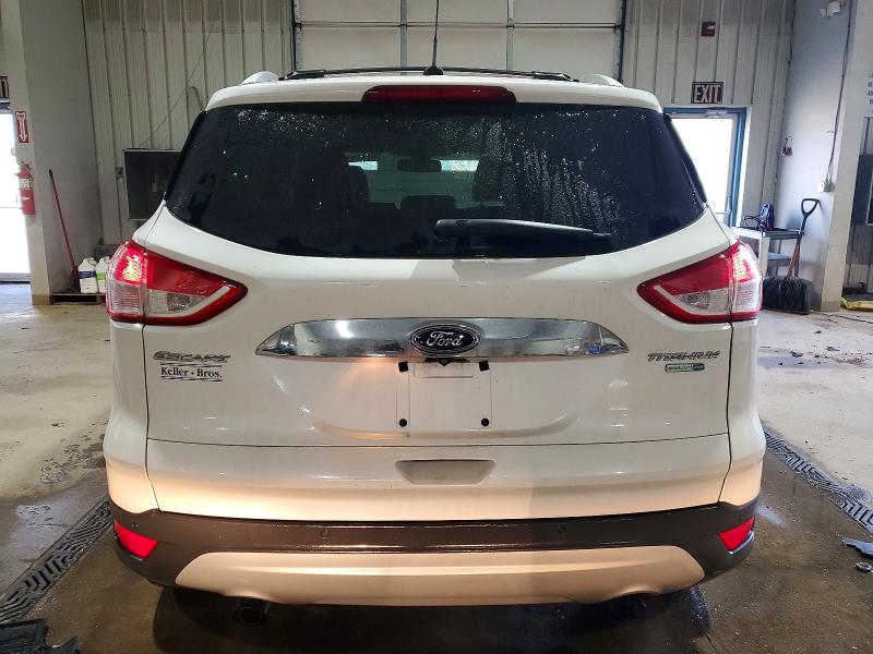 Photo 6 from auction – 2014 FORD ESCAPE TIT with VIN 1FMCU9JX0EUC14578