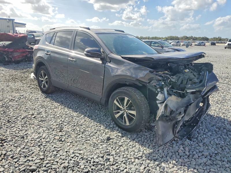 Photo 4 from auction – 2016 TOYOTA RAV4 XLE with VIN JTMWFREV6GJ063335