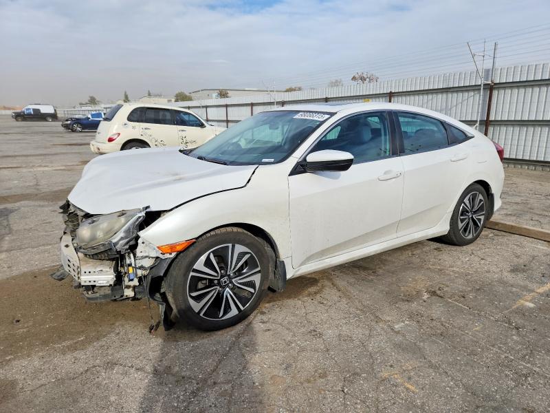 HONDA CIVIC EX 2017 with VIN 19XFC1F30HE212117 - Photo from auction