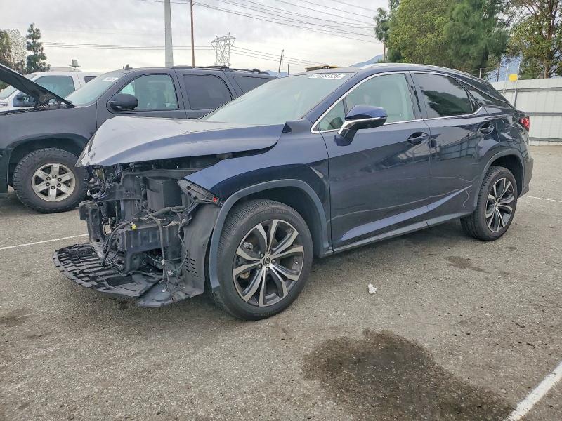 LEXUS RX 2021 with VIN 2T2HZMAA5MC210866 - Photo from auction