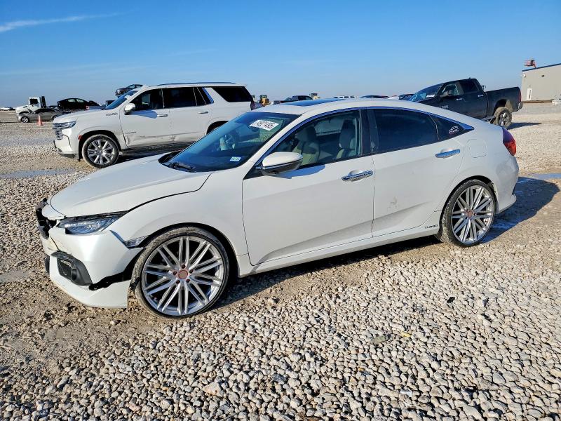 HONDA CIVIC TOUR 2016 with VIN 19XFC1F9XGE211107 - Photo from auction