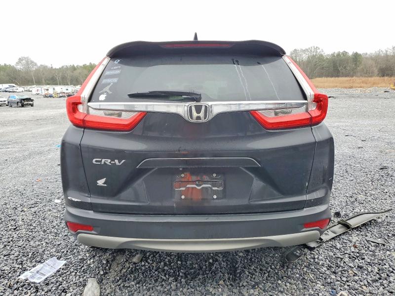 Photo 6 from auction – 2017 HONDA CR-V with VIN 7FARW1H82HE013131