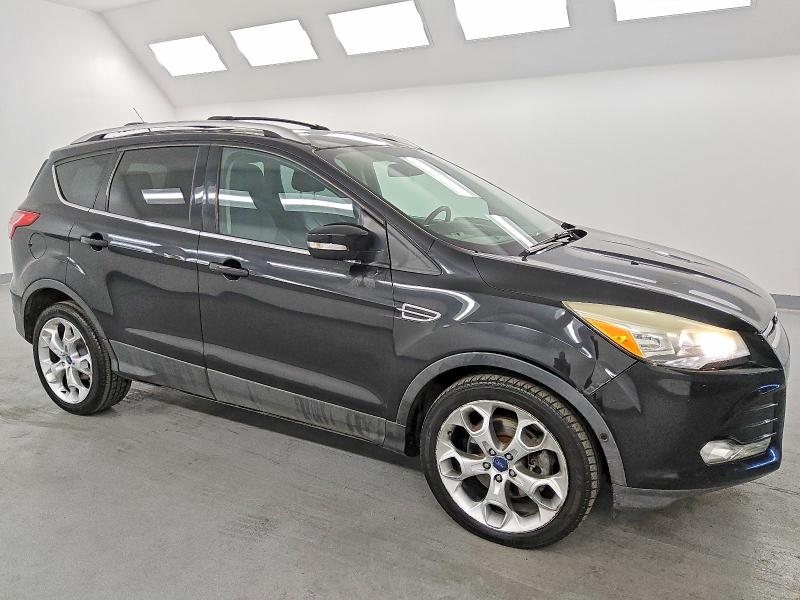 Photo 4 from auction – 2013 FORD ESCAPE TIT with VIN 1FMCU0J99DUC85578