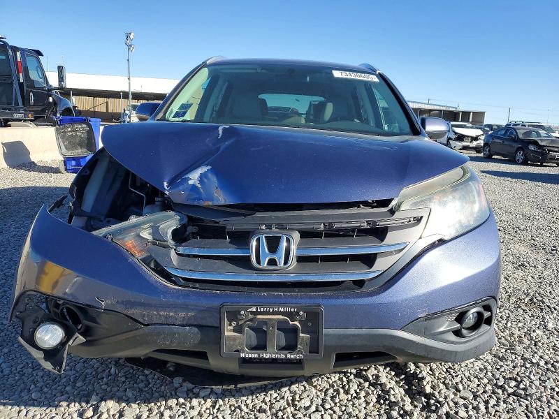 Photo 5 from auction – 2013 HONDA CR-V with VIN 2HKRM4H74DH675735