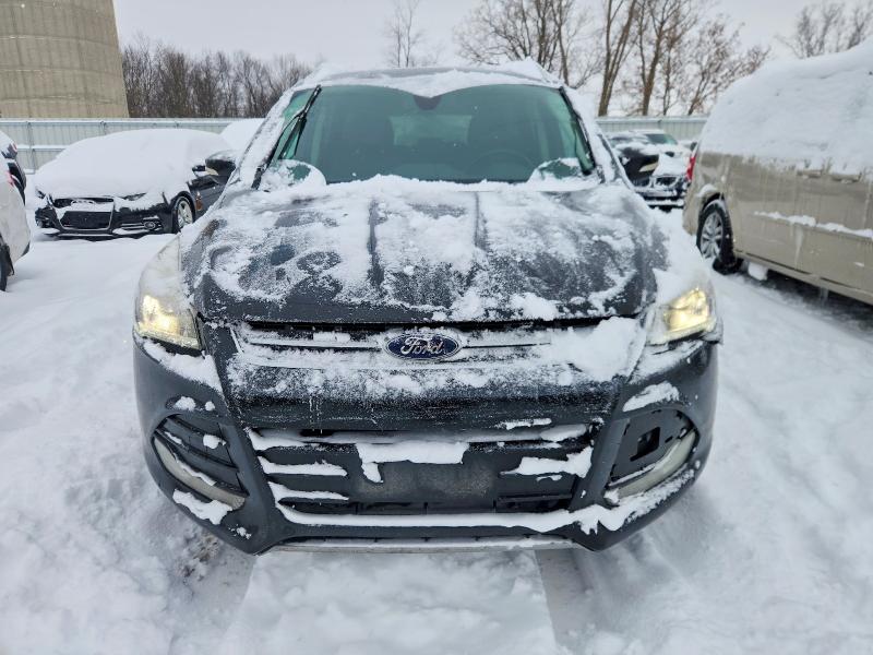 Photo 5 from auction – 2014 FORD ESCAPE with VIN 1FMCU9J93EUA20063
