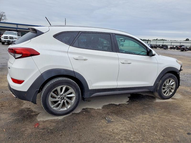 Photo 3 from auction – 2016 HYUNDAI TUCSON LIM with VIN KM8J33A21GU205077