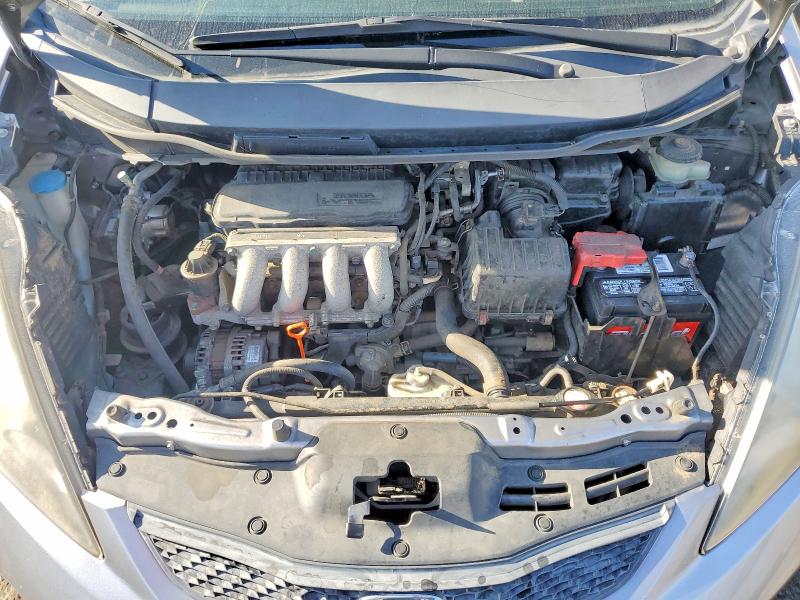 Photo 11 from auction – 2009 HONDA FIT with VIN JHMGE88229S030122