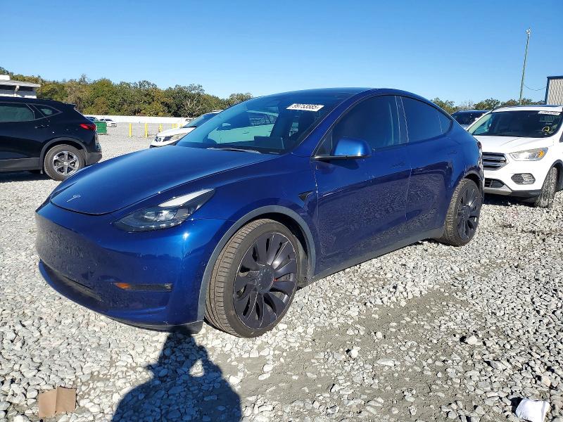 TESLA MODEL Y 2022 with VIN 7SAYGDEF4NF324020 - Photo from auction