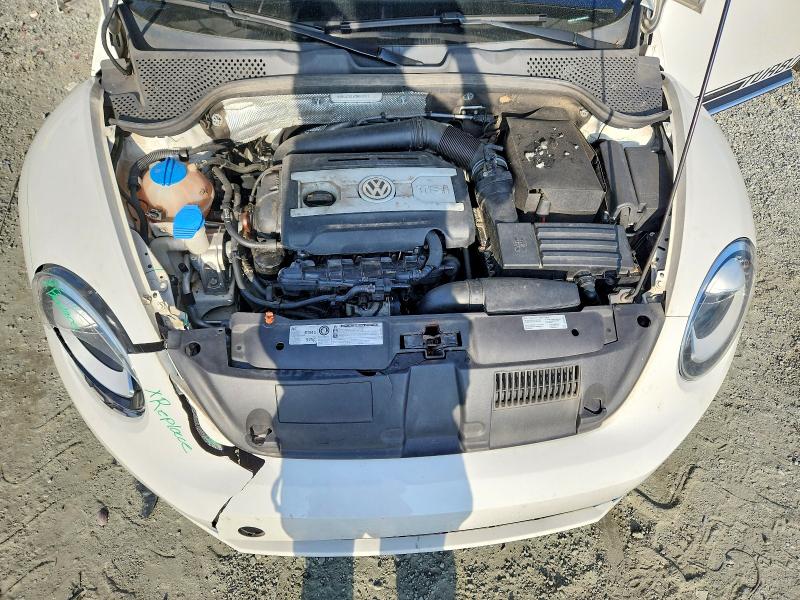 Photo 11 from auction – 2012 VOLKSWAGEN BEETLE TUR with VIN 3VWVA7AT4CM648878