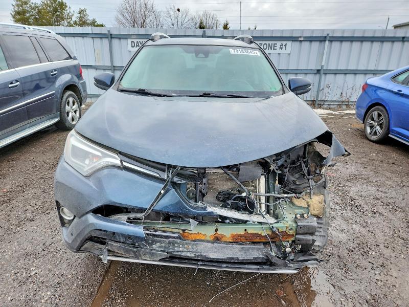 Photo 5 from auction – 2018 TOYOTA RAV4 LIMIT with VIN 2T3DFREV0JW821556