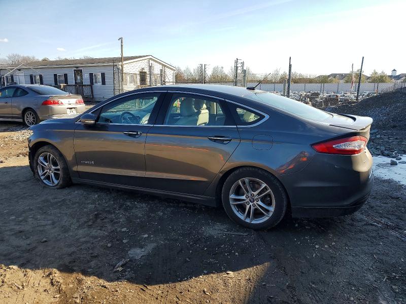 Photo 2 from auction – 2015 FORD FUSION TIT with VIN 3FA6P0RU0FR200158