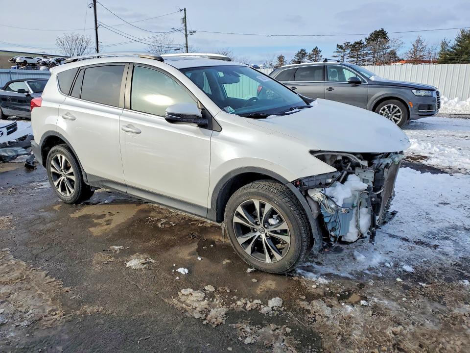 Photo 4 from auction – 2015 TOYOTA RAV4 LIMIT with VIN 2T3DFREV7FW249540