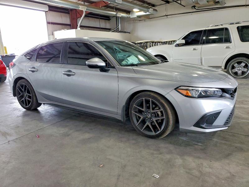 Photo 4 from auction – 2022 HONDA CIVIC SPOR with VIN 19XFL1H87NE019287