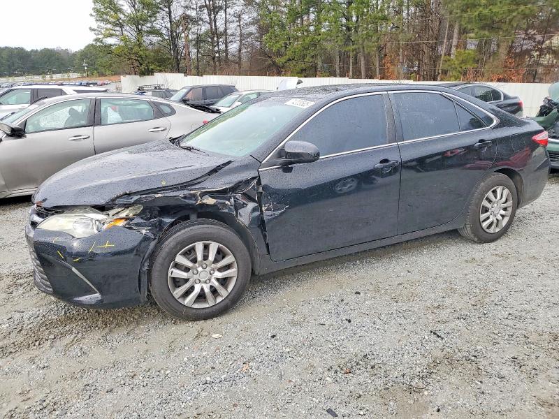TOYOTA CAMRY LE 2016 with VIN 4T1BF1FKXGU261950 - Photo from auction