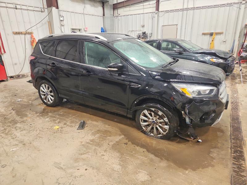Photo 4 from auction – 2017 FORD ESCAPE TIT with VIN 1FMCU9J97HUB75445