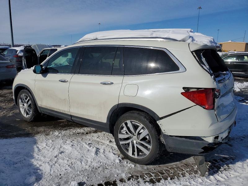 Photo 2 from auction – 2016 HONDA PILOT with VIN 5FNYF6H02GB064299