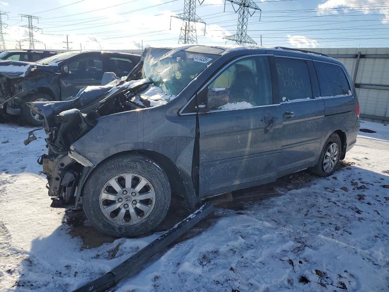 HONDA ODYSSEY EX 2010 with VIN 5FNRL3H75AB061042 - Photo from auction