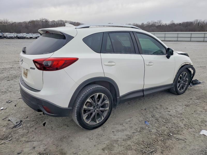 Photo 3 from auction – 2016 MAZDA CX-5 with VIN JM3KE2DYXG0864416