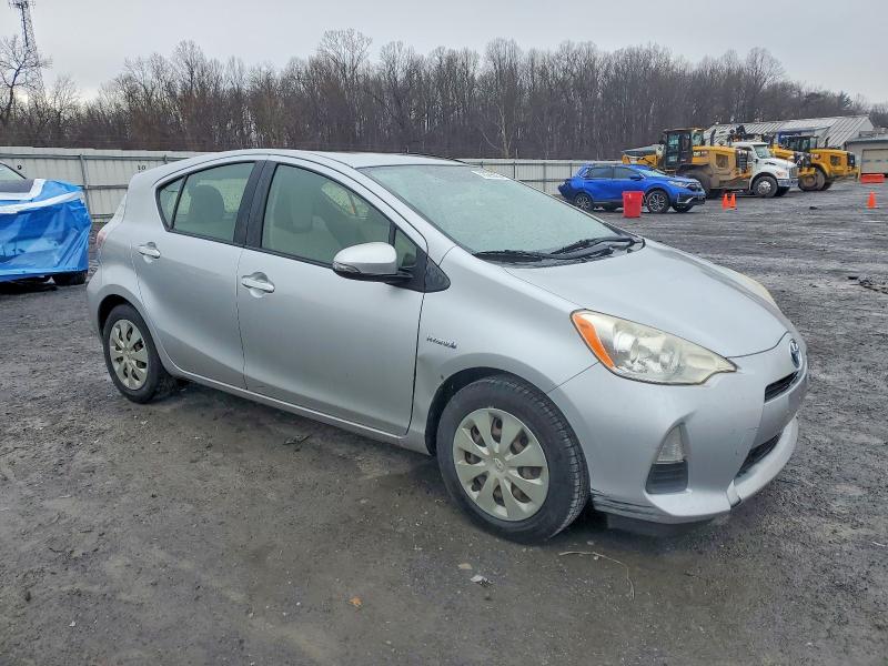 Photo 4 from auction – 2014 TOYOTA PRIUS C with VIN JTDKDTB31E1065916