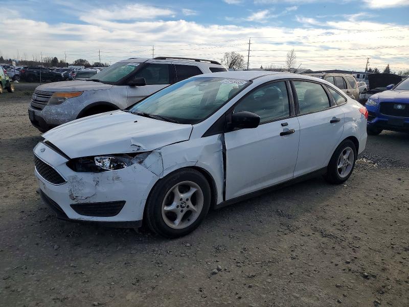 FORD FOCUS S 2016 with VIN 1FADP3E28GL310713 - Photo from auction