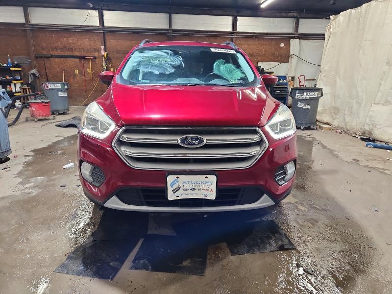 Photo 5 from auction – 2018 FORD ESCAPE with VIN 1FMCU9HD6JUA18764