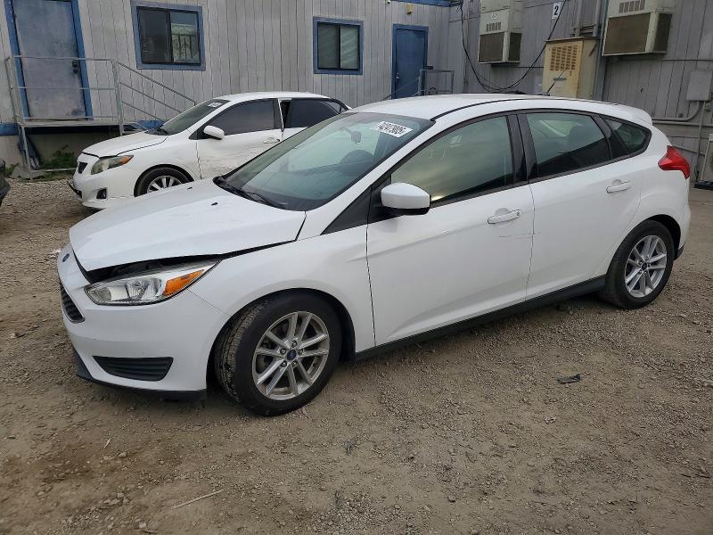 FORD FOCUS SE 2018 with VIN 1FADP3K29JL251053 - Photo from auction