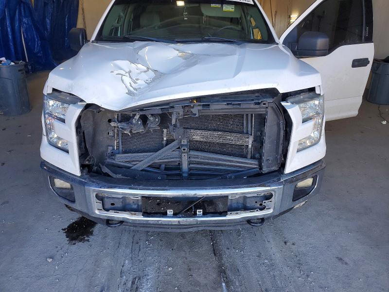 Photo 11 from auction – 2015 FORD F150 SUPER with VIN 1FTFW1EFXFFB49131