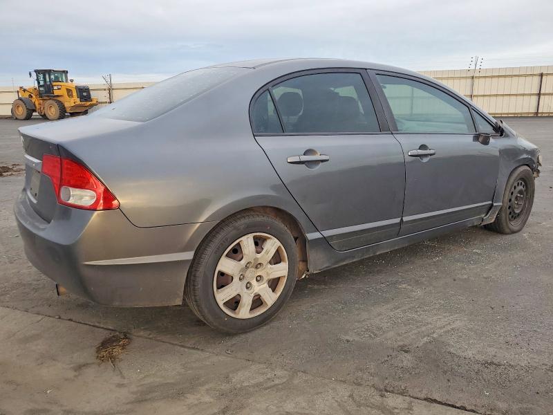 Photo 3 from auction – 2010 HONDA CIVIC LX with VIN 19XFA1F50AE037879
