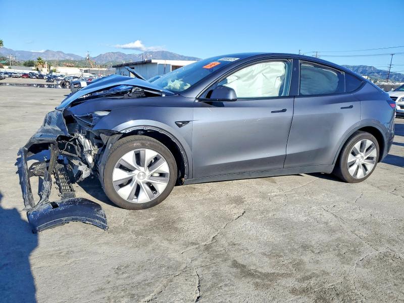 TESLA MODEL Y 2023 with VIN 7SAYGDED8PF957329 - Photo from auction