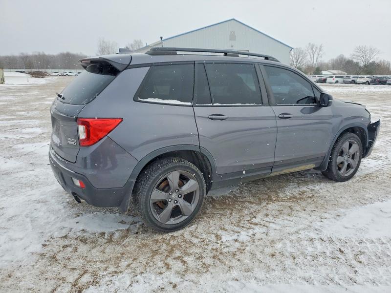 Photo 3 from auction – 2021 HONDA PASSPORT T with VIN 5FNYF8H97MB004136