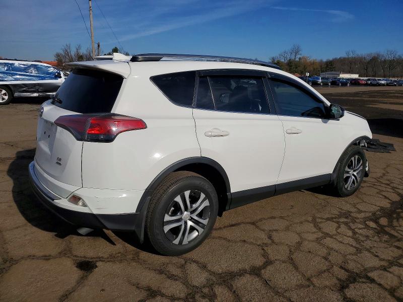 Photo 3 from auction – 2017 TOYOTA RAV4 LE with VIN JTMBFREV5HJ141359