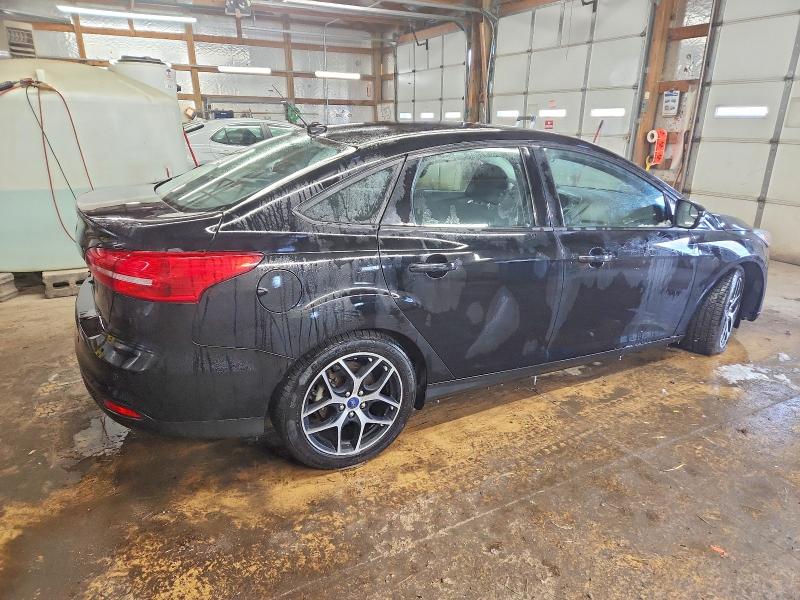 Photo 3 from auction – 2017 FORD FOCUS SEL with VIN 1FADP3H24HL225350