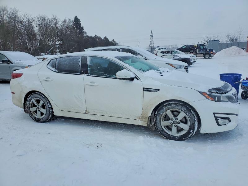 Photo 4 from auction – 2014 KIA OPTIMA LX with VIN KNAGM4A76E5520636