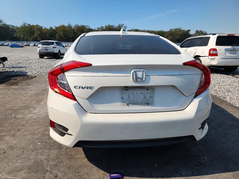 Photo 6 from auction – 2018 HONDA CIVIC EX with VIN 19XFC2F77JE040036
